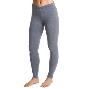 A lady wearing a charcoal heather stretch legging petite.