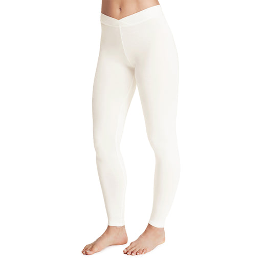 Ivory; Model is wearing size S. She is 5’9”, Bust 32”, Waist 25.5”, Hips 36”. @A lady wearing a ivory stretch legging petite.