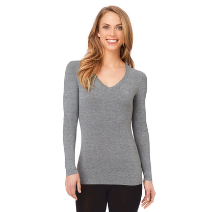 Charcoal Heather; Model is wearing size S. She is 5’9”, Bust 32”, Waist 25.5”, Hips 36”. @A lady wearing a charcoal heather long sleeve stretch V-neck PETITE.