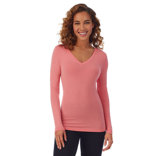 Bright Coral; Model is wearing size S. She is 5’9”, Bust 34”, Waist 23”, Hips 35”. @A lady wearing a bright coral long sleeve stretch V-neck PETITE.