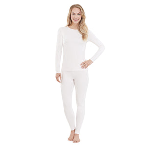 A lady wearing white long sleeve crew top