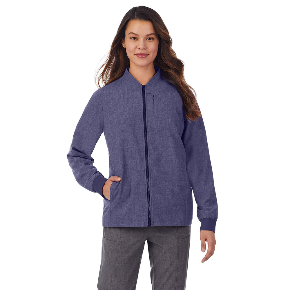 A lady wearing blue scrub jacket
