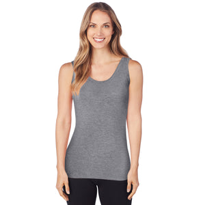 A lady wearing a charcoal heather sleeveless reversible tank.