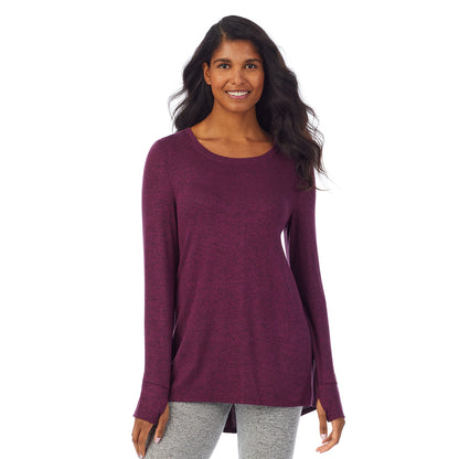 Marled Grape; Model is wearing size S. She is 5’10”, Bust 34”, Waist 24”, Hips 34”. @A lady wearing a marled grape long sleeve tunic.