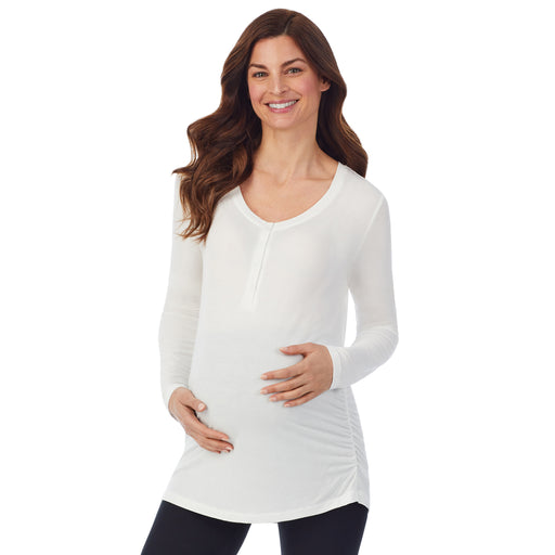 Ivory; Model is wearing size S. She is 5’9”, Bust 34”, Waist 24.5”, Hips 36.5”. @A lady wearing a ivory long sleeve maternity snap front henley top. #Model is wearing a maternity bump.
