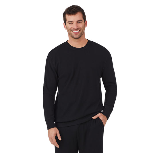 Black; Model is wearing size M. He is 6'1", Waist 31", Inseam 33". @A man wearing a black waffle thermal relaxed crew..