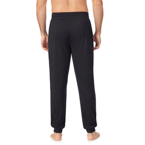  A man wearing black pant
