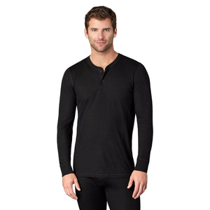 A man wearing black long sleeve henley