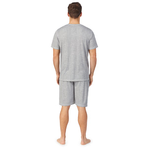  A lady wearingMens Short Sleeve Crew Neck Top and Pant Pajama Set with Light Blue Stripes print