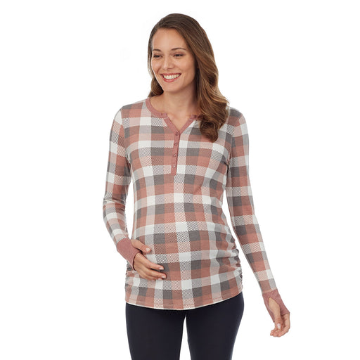 A lady wearing taupe grey buffalo check long sleeves stretch thermal maternity split v-neck henley.