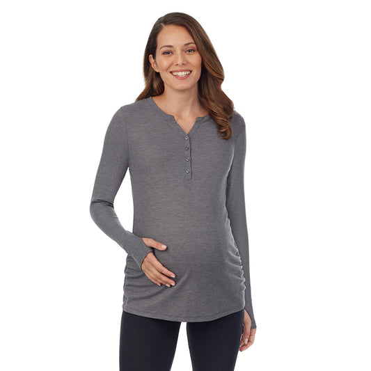  A lady wearingUltra Cozy Maternity Long Sleeve Funnel Neck Tunic with Olive Moss Heather print