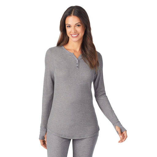 Stone Grey Heather; 'Model is wearing size S. She is 5’9”, Bust 32”, Waist 25”, Hips 35”. @A lady wearing a stone grey heather long sleeve split V-Neck.