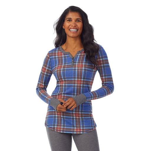 Red Blue Plaid; 'Model is wearing size S. She is 5’10”, Bust 34”, Waist 24”, Hips 34”. @A lady wearing a red blue plaid long sleeve split V-Neck.