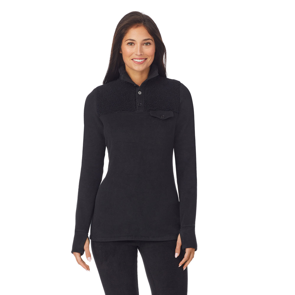 upper body of a lady wearing black long sleeve mixed media mock !59% Polyester, 35% Recycled Polyester, 6% Spandex!