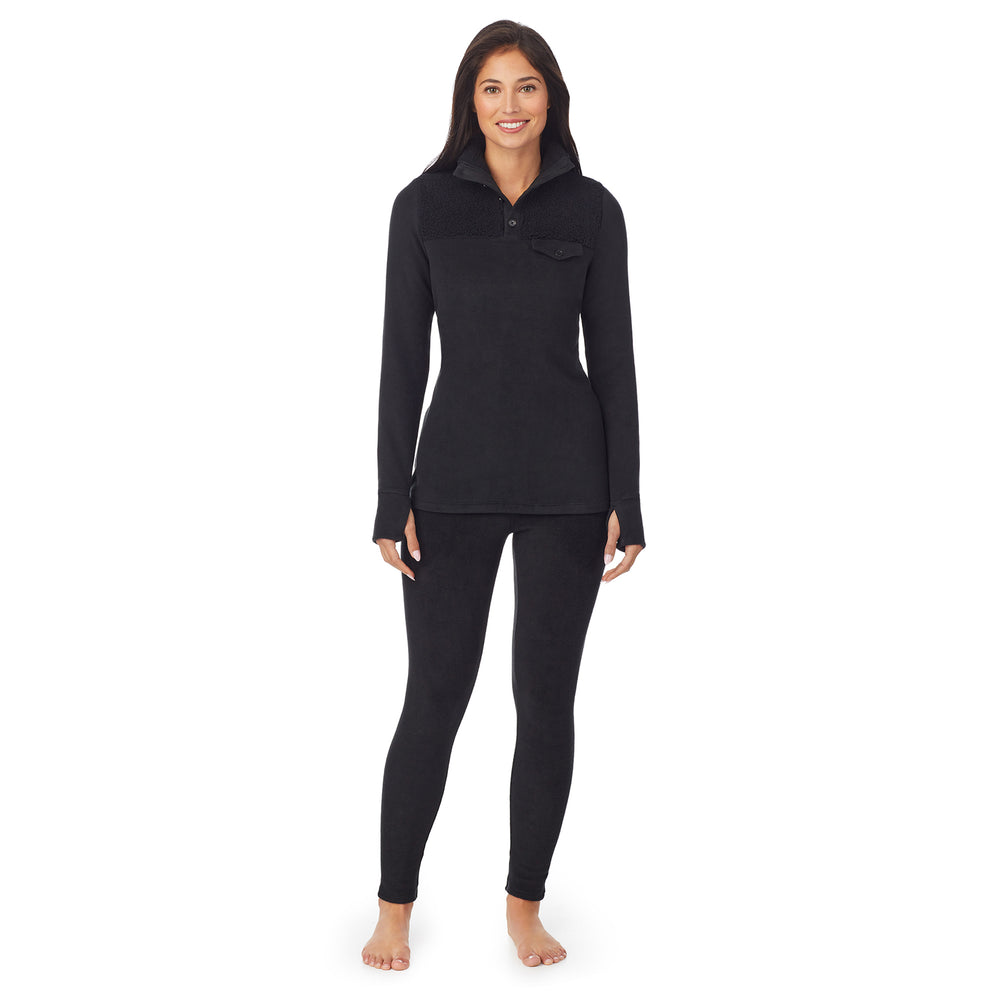 a lady wearing black long sleeve mixed media mock !59% Polyester, 35% Recycled Polyester, 6% Spandex!