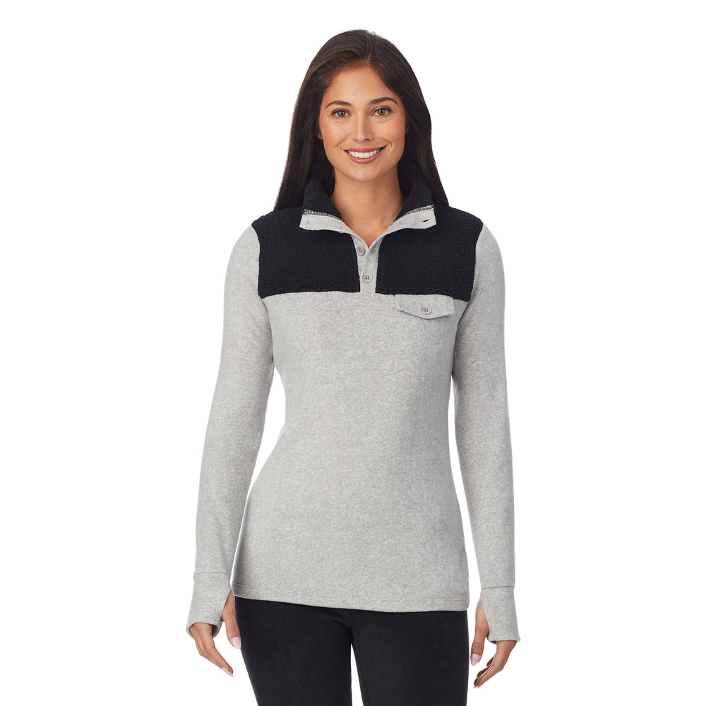 upper body of a lady wearing grey long sleeve mixed media mock !59% Polyester, 35% Recycled Polyester, 6% Spandex!