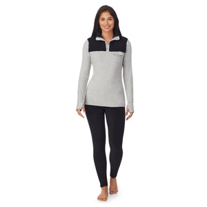 a lady wearing grey long sleeve mixed media mock !59% Polyester, 35% Recycled Polyester, 6% Spandex!