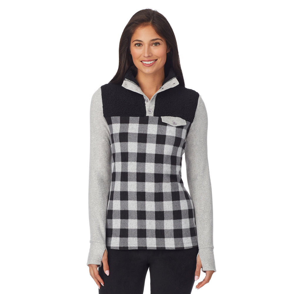 upper body of a lady wearing grey buffalo long sleeve mixed media mock !59% Polyester, 35% Recycled Polyester, 6% Spandex!