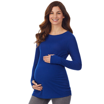 Royal Blue; Model is wearing size S. She is 5’9”, Bust 34”, Waist 24.5”, Hips 36.5”. @A lady wearing a royal blue long sleeve maternity ballet neck top. #Model is wearing a maternity bump.