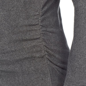 upper body of a lady wearing a grey maternity snap front crew #Model is wearing a maternity bump.
