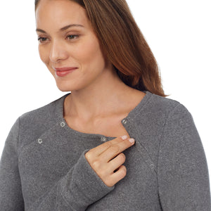 upper body of a lady wearing a grey maternity snap front crew. #Model is wearing a maternity bump.