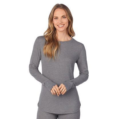 Stone Grey Heather; Model is wearing size S. She is 5’9”, Bust 32”, Waist 25.5”, Hips 36”. @A lady wearing a stone grey heather long sleeve crew.