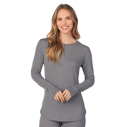 A lady wearing a stone grey heather long sleeve crew.