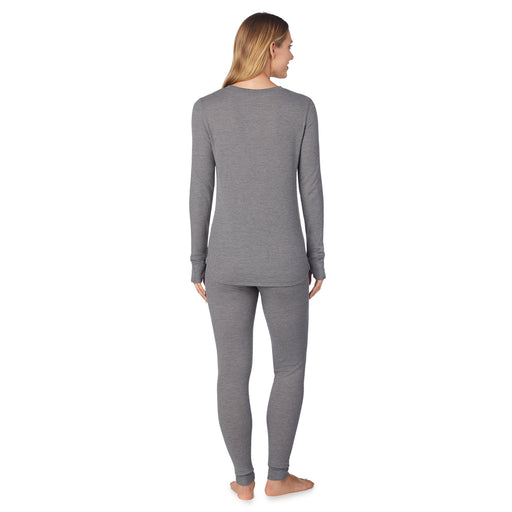 Stone Grey Heather; 'Model is wearing size S. She is 5’9”, Bust 32”, Waist 25.5”, Hips 36”. @A lady wearing a stone grey heather long sleeve crew.