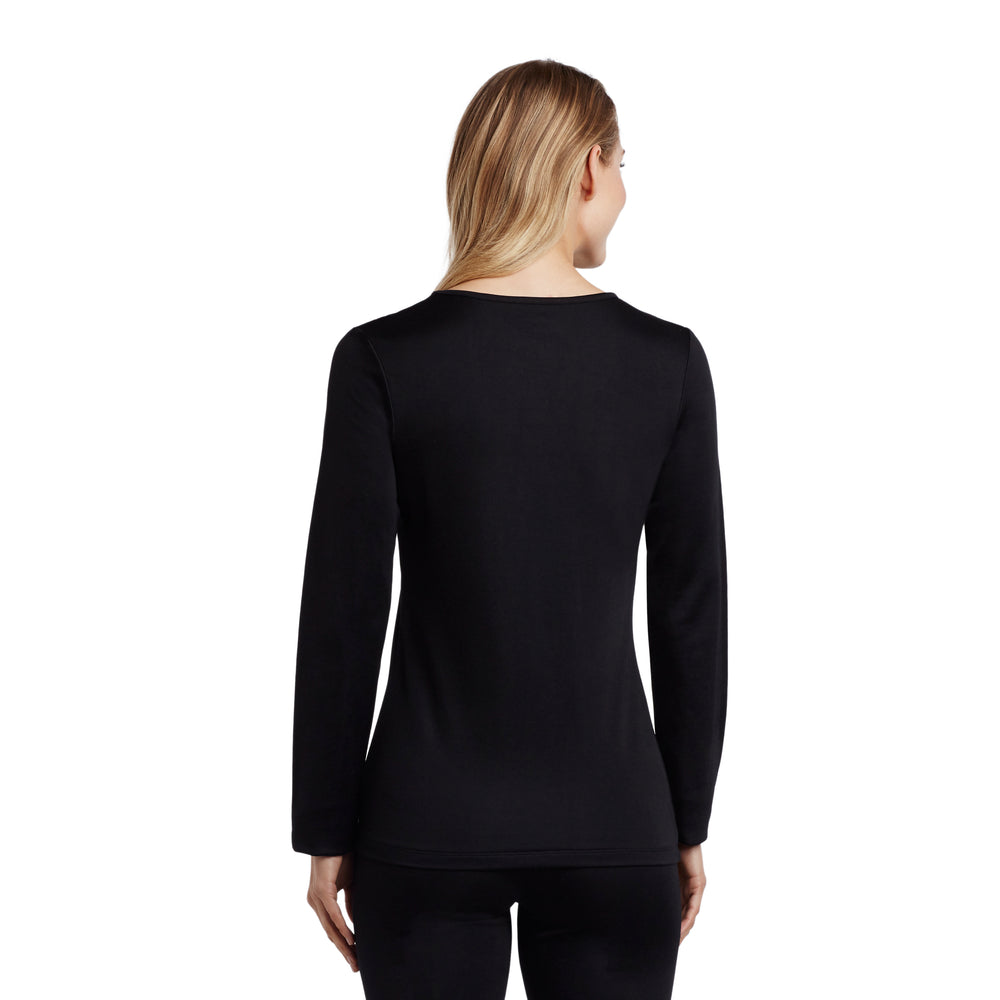 A lady wearing a black long sleeve crew.