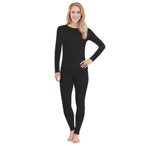 A lady wearing black long sleeve crew top