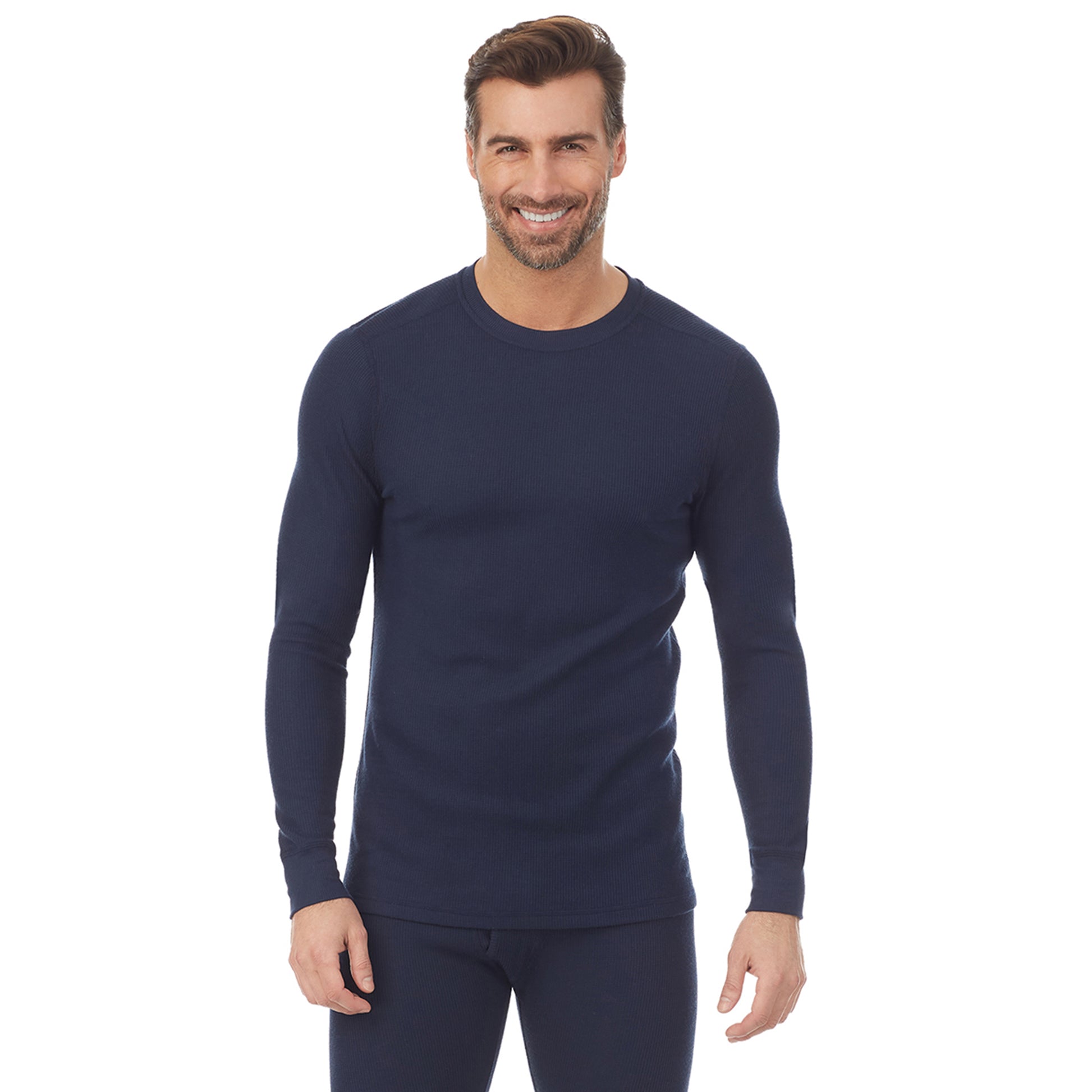Navy; Model is wearing size M. He is 6'1", Waist 32", Inseam 32". @A man wearing a navy waffle thermal long sleeve crew.