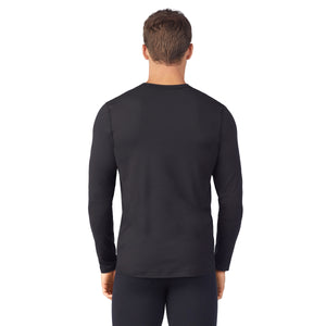 upper body of A man wearing black long sleeve crew
