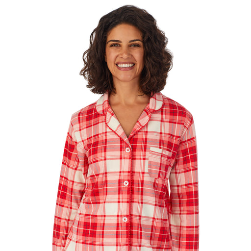 Red Ivory Plaid; Model is wearing size S. She is 5’9”, Bust 32”, Waist 24”, Hips 34.5”. @A lady wearing a white long sleeve pajama set with red ivory plaid.