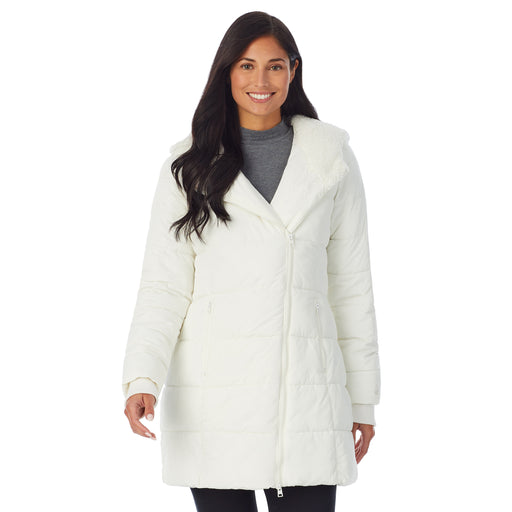 upper body of a lady wearing white long puffer coat