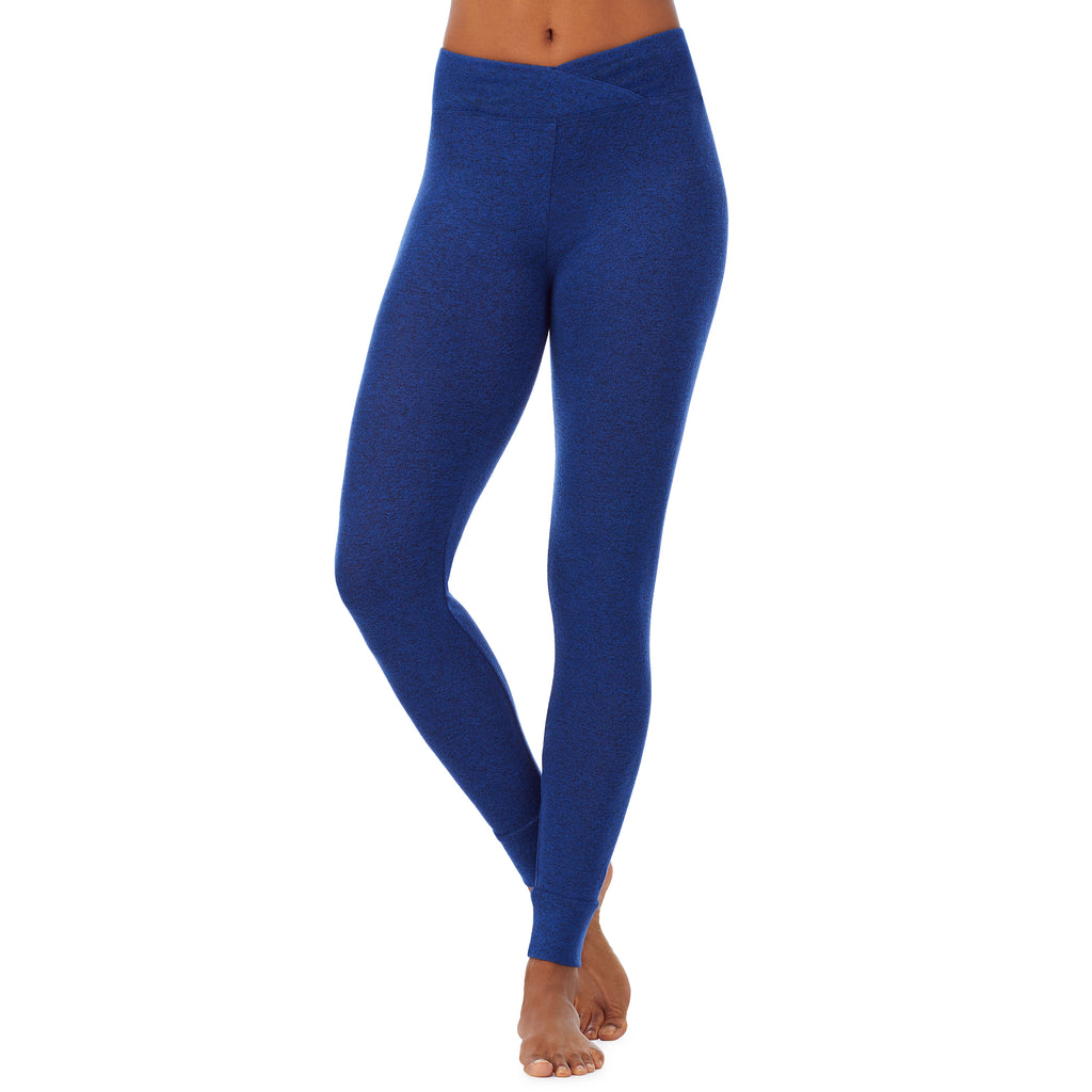 A lady wearing a marled royal blue legging.