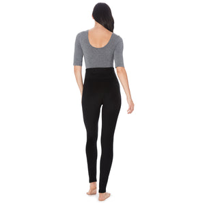 A lady wearing maternity legging #Model is wearing a black maternity bump.