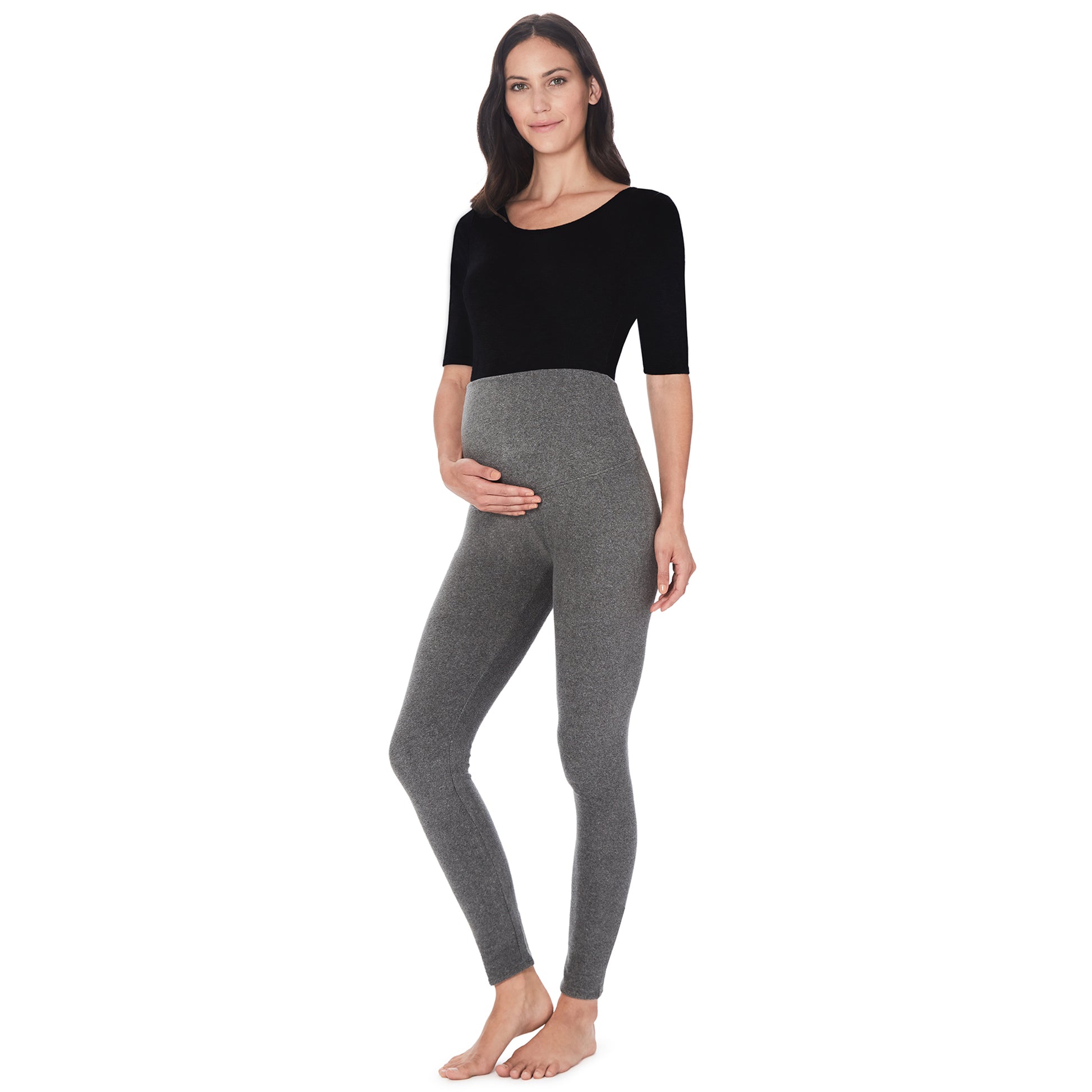 Charcoal Heather; Model is wearing size S. She is 5’9”, Bust 34”, Waist 24.5”, Hips 36.5”.@A lady wearing maternity legging #Model is wearing a grey maternity bump.
