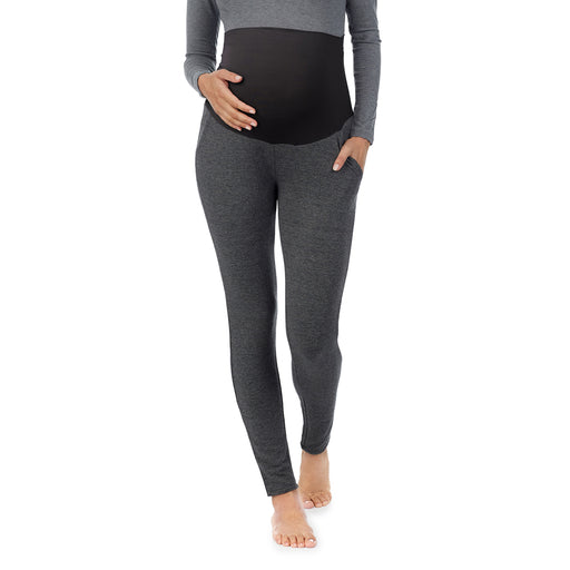 A lady wearing a charcoal heather legging. 