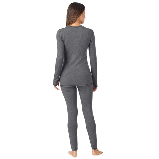 Charcoal Heather; Model is wearing size S. She is 5’9”, Bust 32”, Waist 25”, Hips 35”. @A lady wearing a charcoal heather legging.