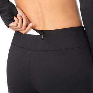 A lady wearing a black high-waisted legging.