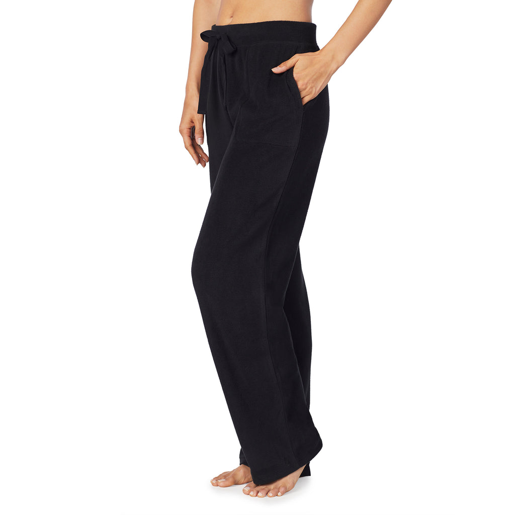 A lady wearing Fleecewear With Stretch Lounge Pant in Black close up close up