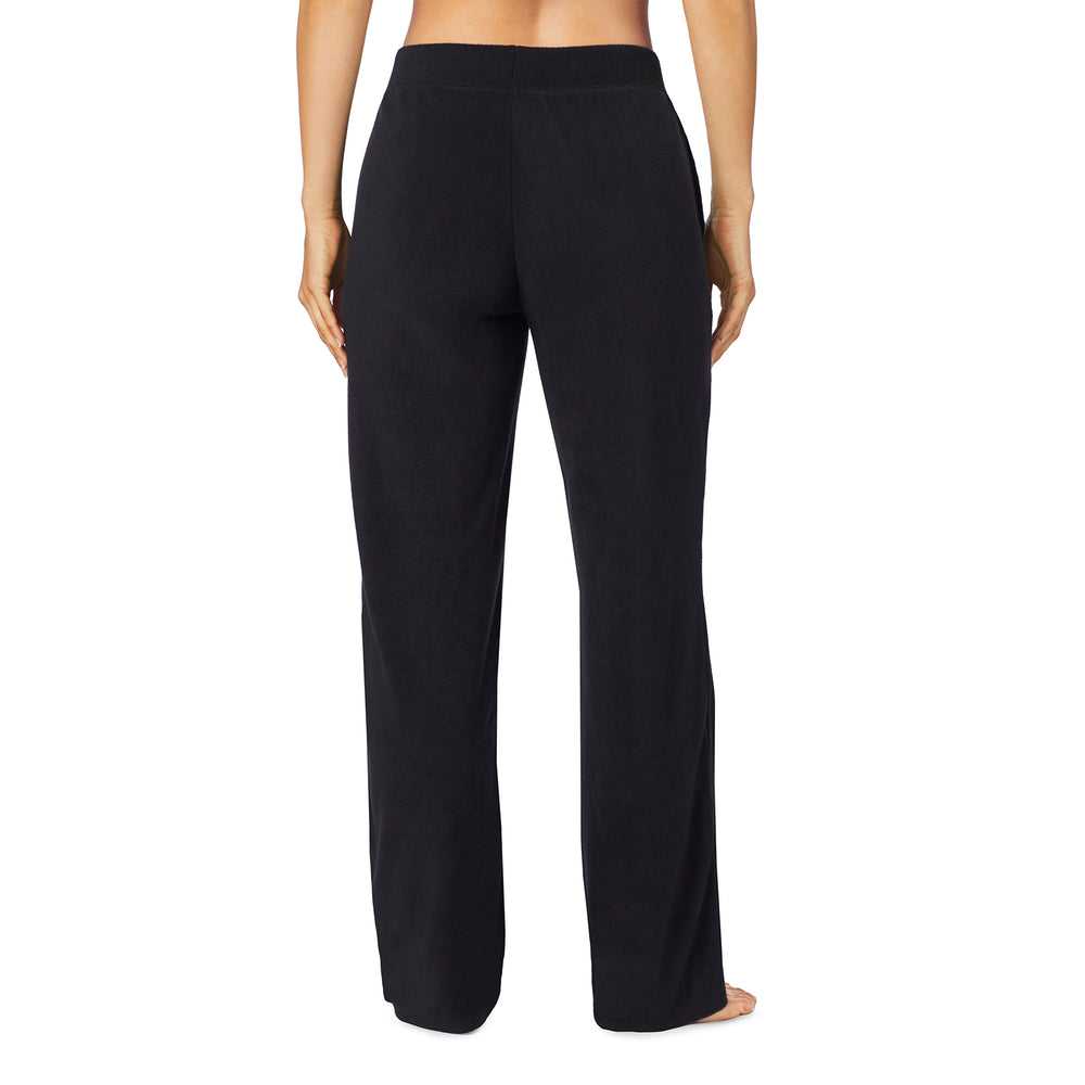 A lady wearing Fleecewear With Stretch Lounge Pant in Black back view back view