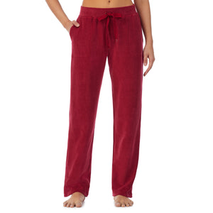 lower body of a lady wearing red lounge pant
