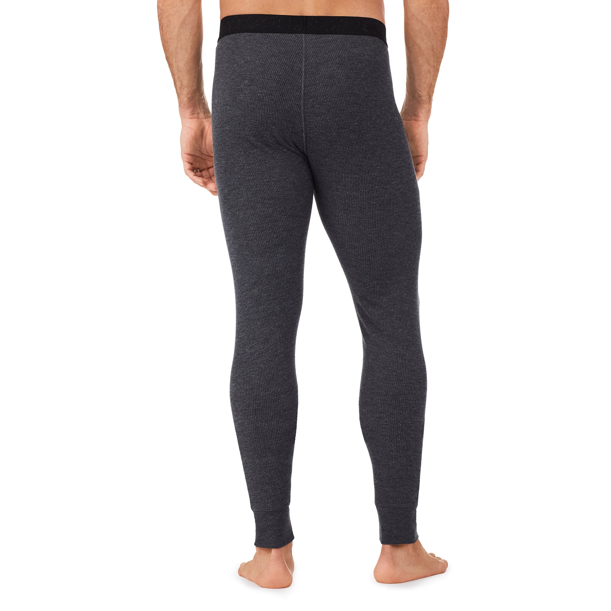 Charcoal Heather; Model is wearing size M. He is 6'1", Waist 31", Inseam 33". @A man wearing a charcoal heather waffle thermal pant.