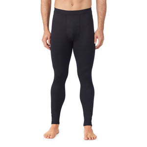 lower body of a man wearing black pants