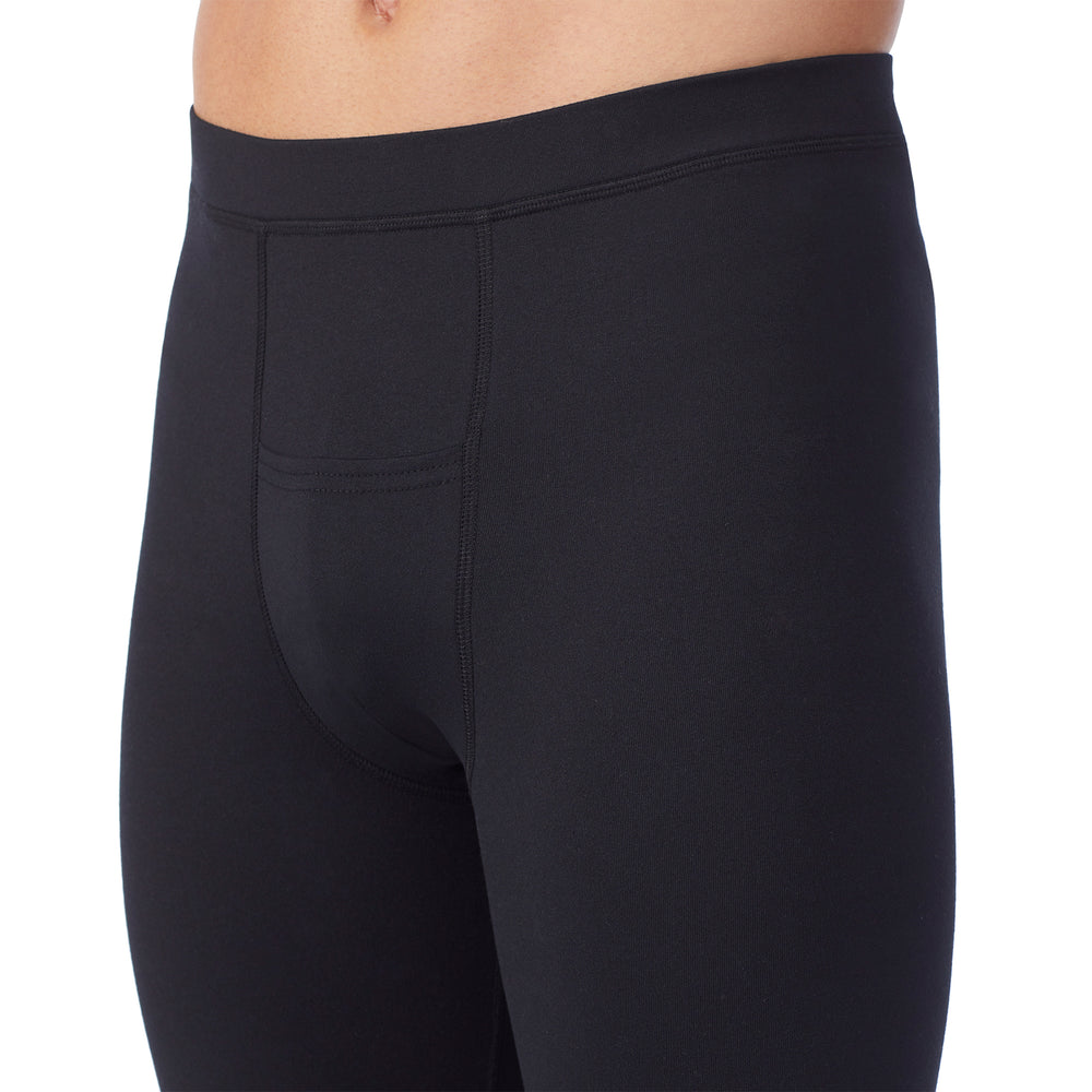 lower body of a man wearing black pants