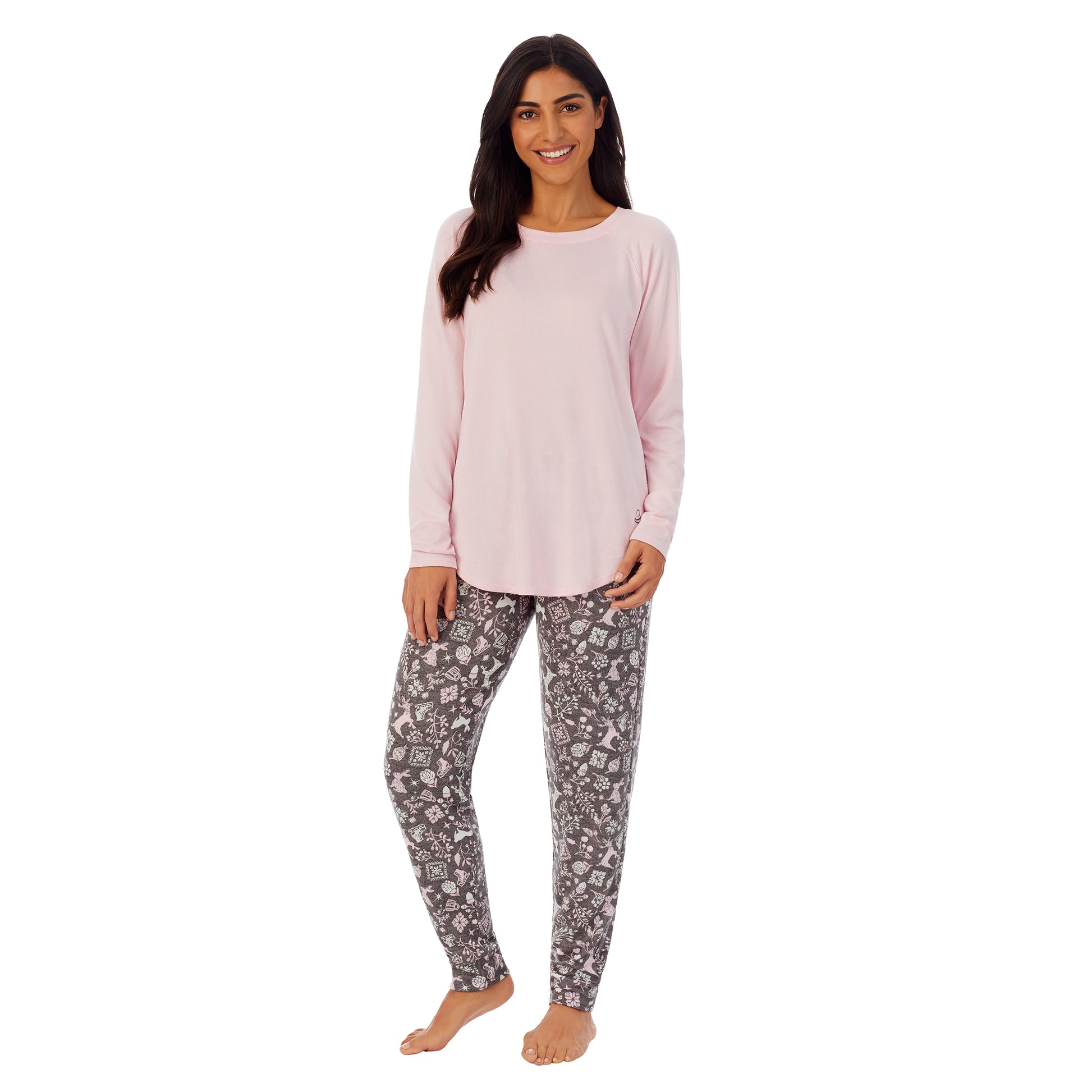 A lady wearing pink long sleeve top and grey pajama set