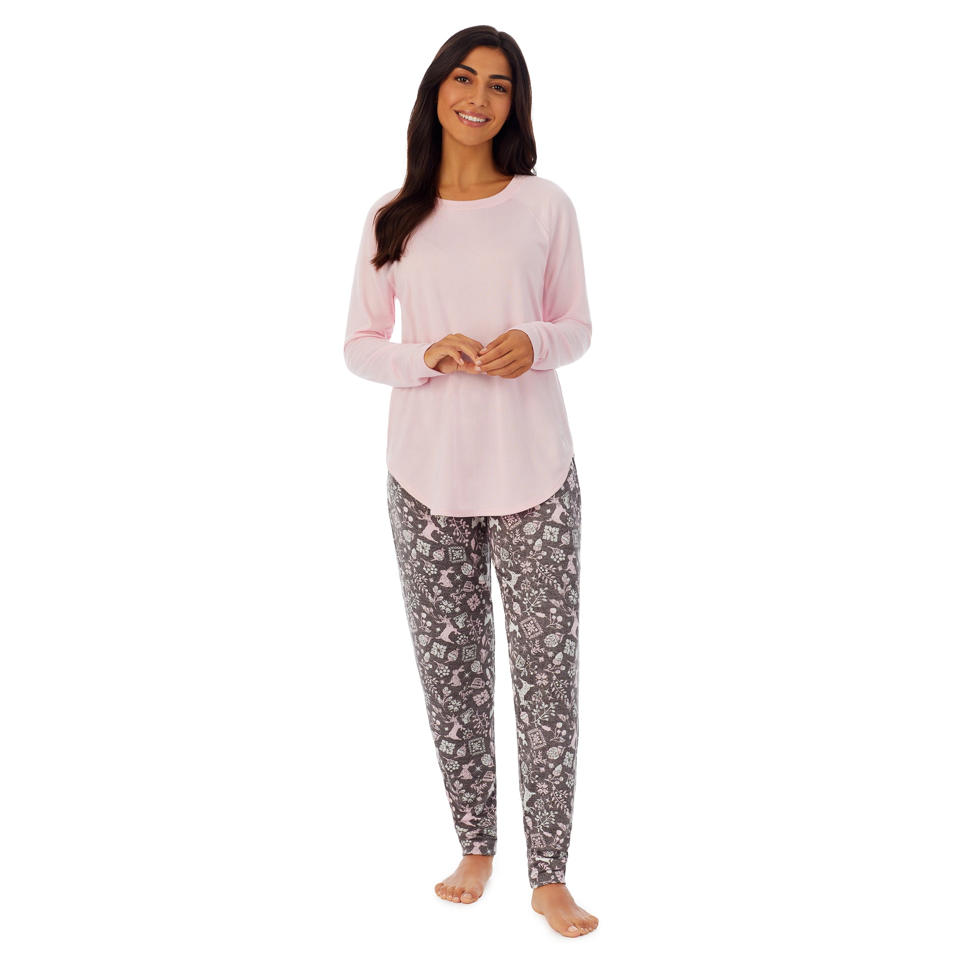 A lady wearing pink long sleeve top and grey pajama set