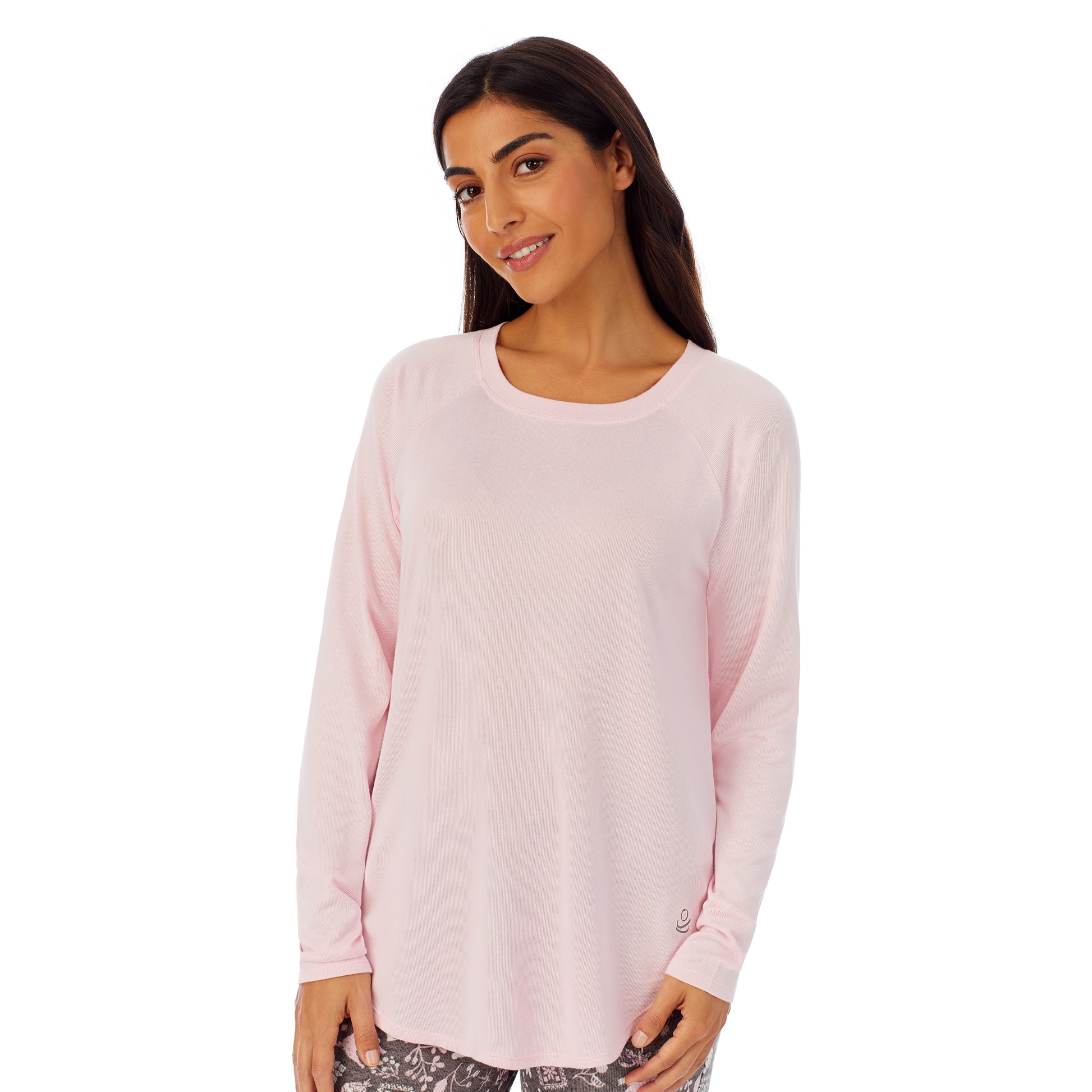 Upper body of a lady wearing pink long sleeve top and grey pajama set