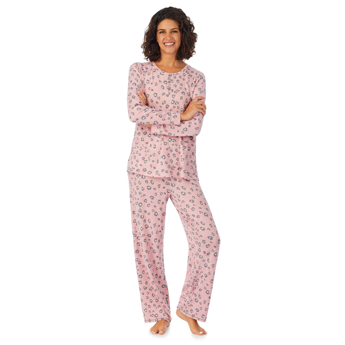 Pink Pop Animal; Model is wearing size S. She is 5’9”, Bust 32”, Waist 24”, Hips 34.5”. @A lady wearing a pink long sleeve pajama set with pop animal pattern.